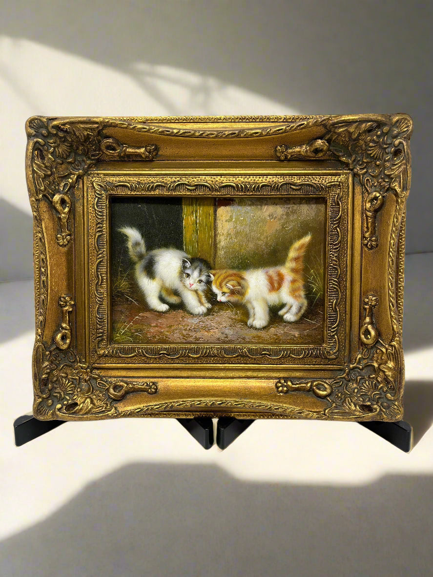 oil painting with two kittens sitting in a box