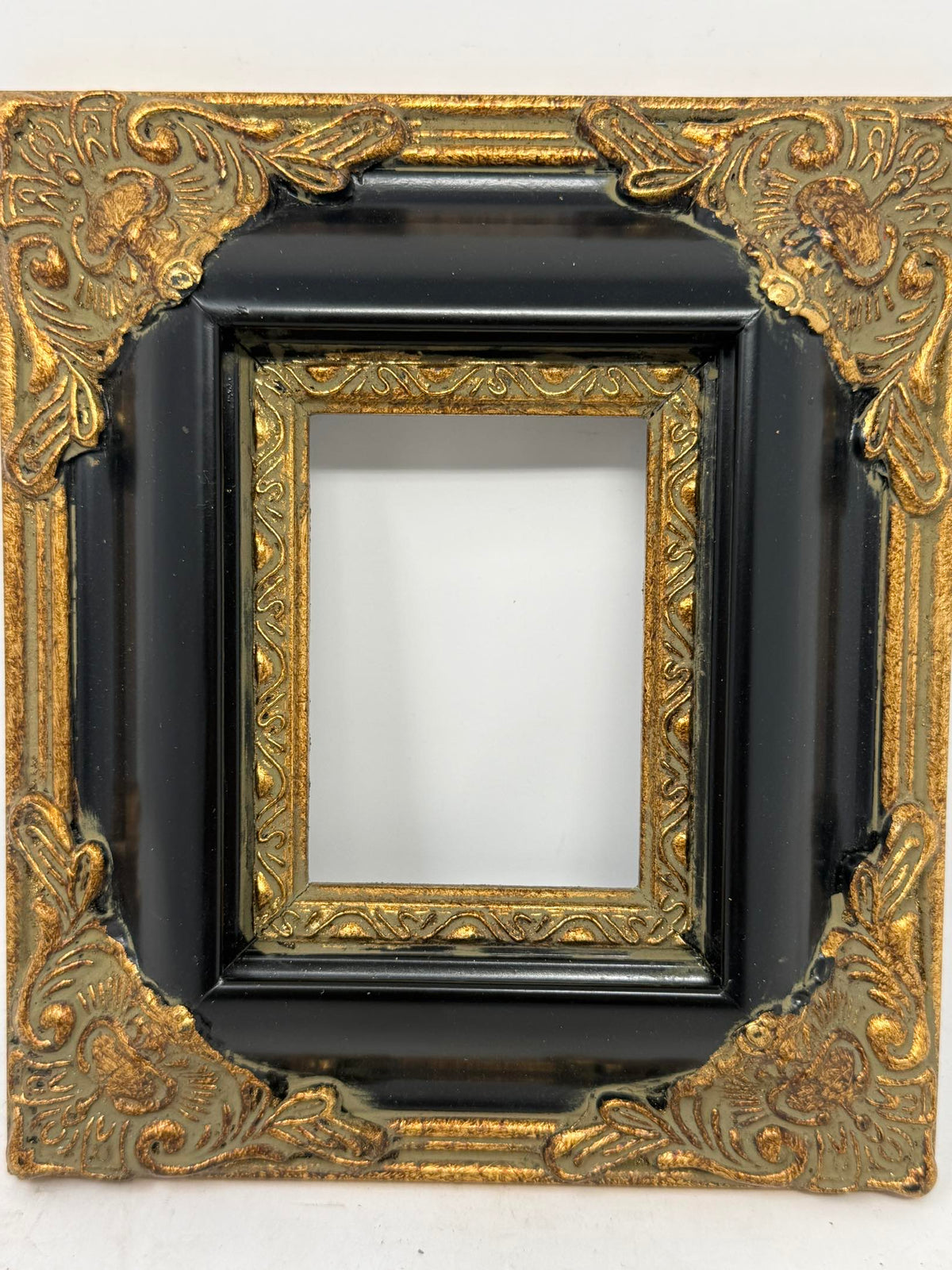 Decorative Black & Gold Picture Frame with Ornate Corner Details