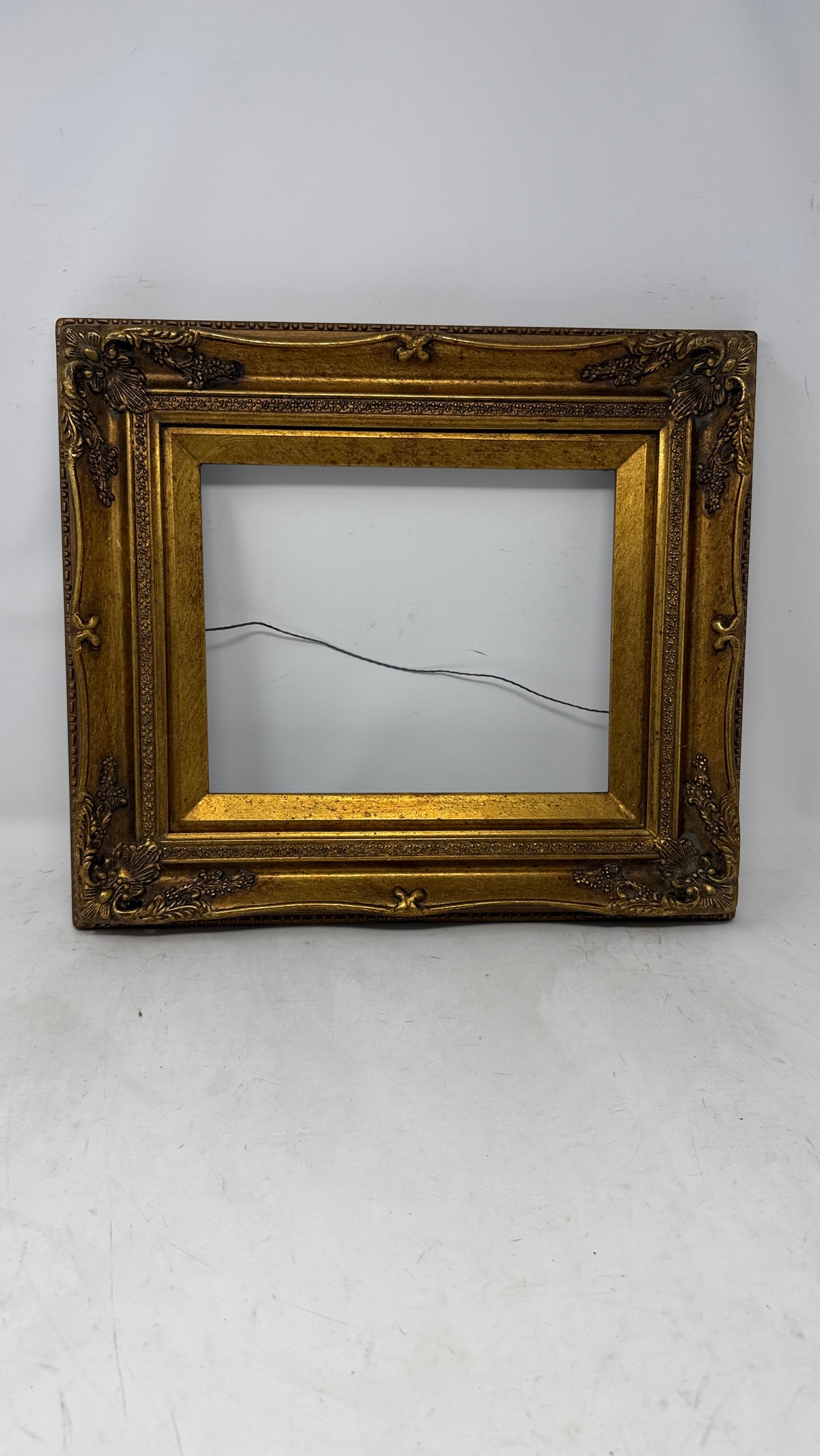 Florentine Charm — Ornate Gold-Tone Frame