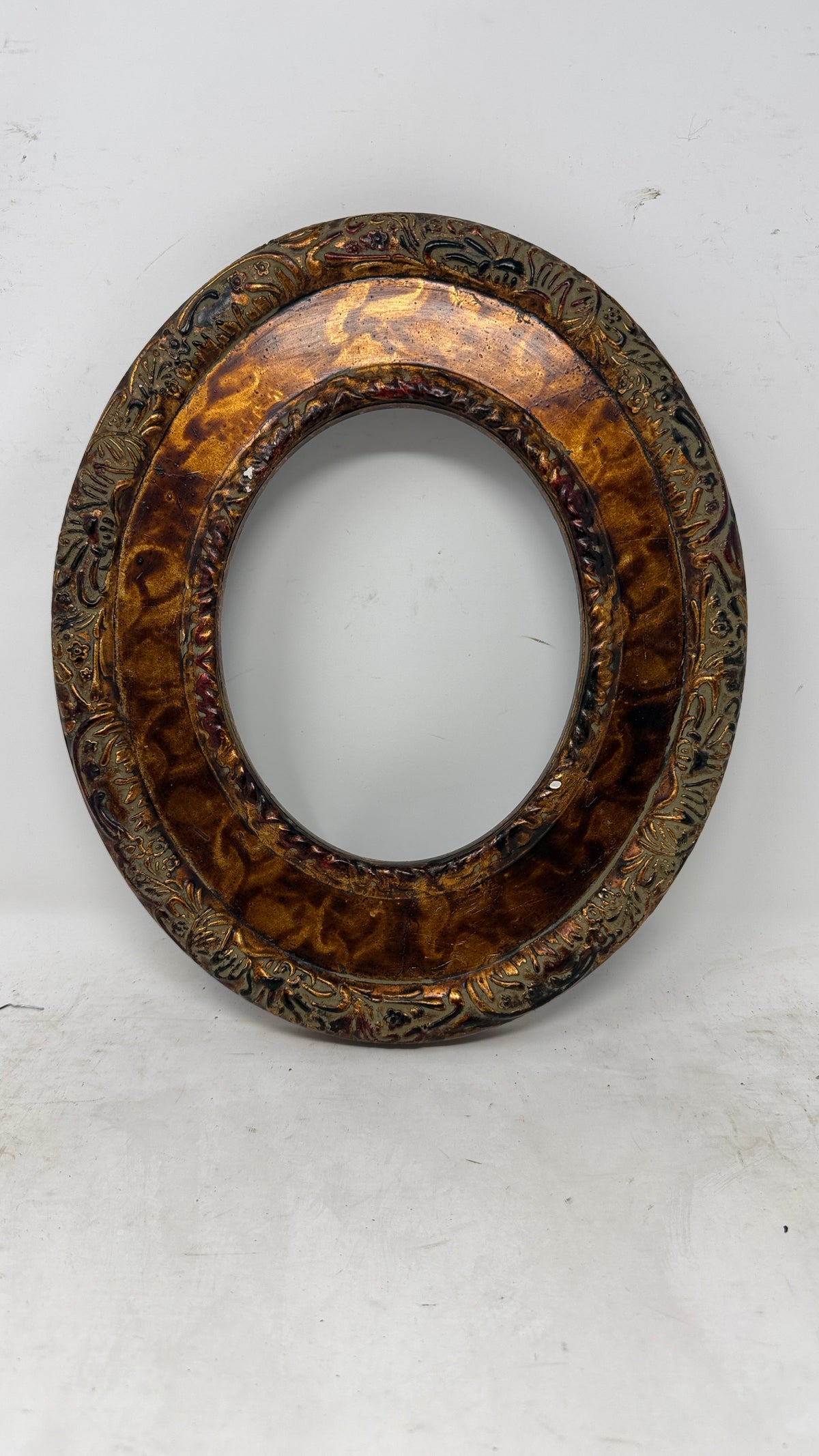 Ornate Oval Frame with Aged Gilded Finish